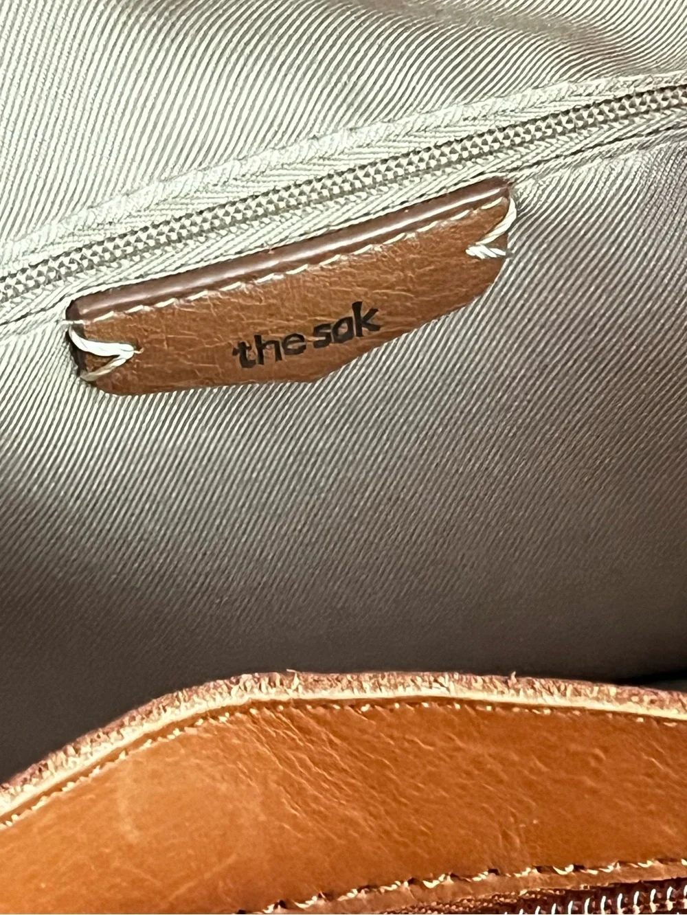The Sak Melrose Shoulder Bag Purse Brown Leather Tassel Charm Many Pockets